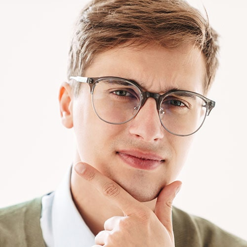 Thoughtful Young Guy Student In Eyeglasses 4fg5usn.jpg