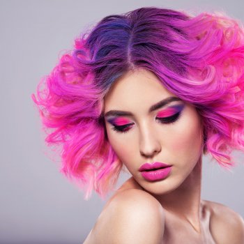 Portrait Of Beautiful Young Woman With Bright Pink Makeup .jpg
