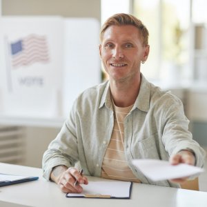 Smiling Man At Voting Station.jpg
